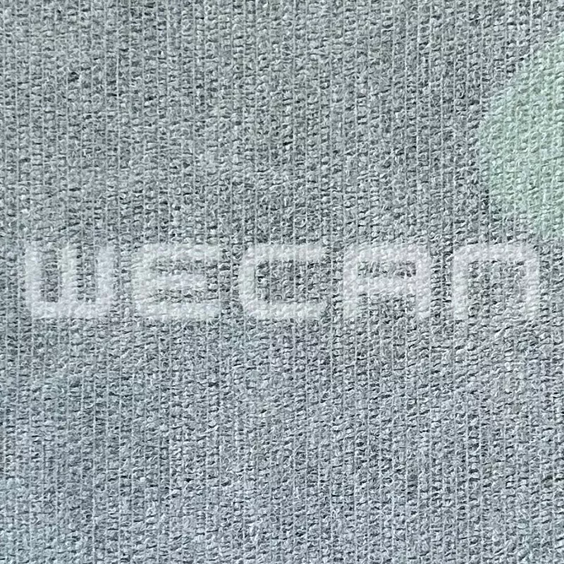 Soft fine-denier elastic nonwoven fabric
