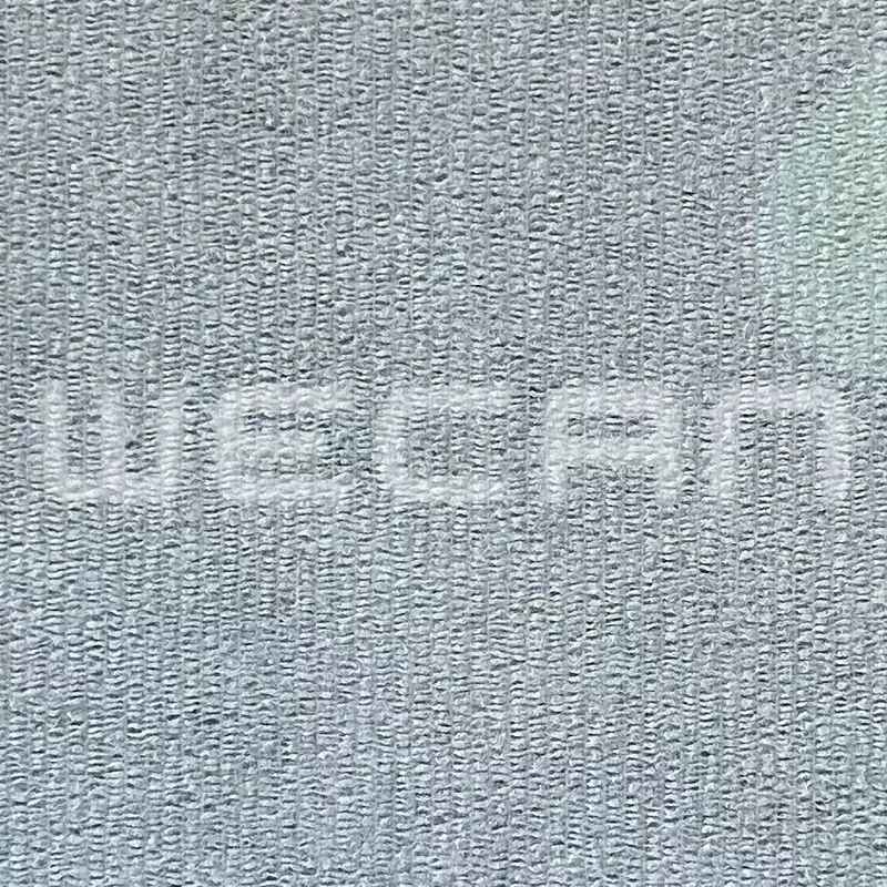 Luxuriously soft fine-denier elastic nonwoven fabric